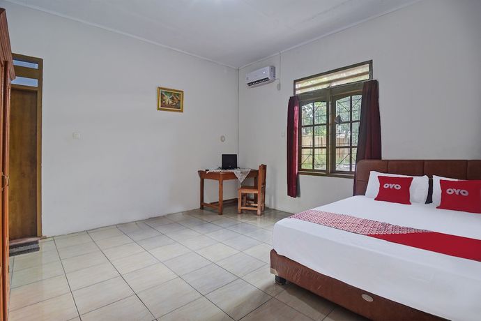 Imagen de la habitación del Hotel OYO 92041 Borneo. Foto 4