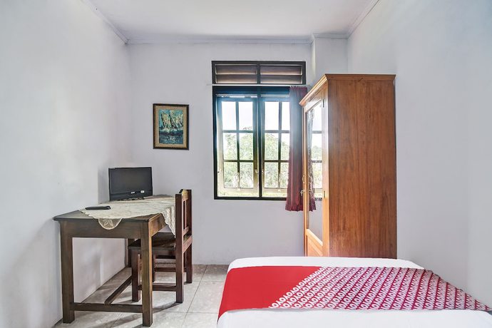 Imagen de la habitación del Hotel OYO 92041 Borneo. Foto 6