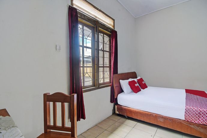 Imagen de la habitación del Hotel OYO 92041 Borneo. Foto 8