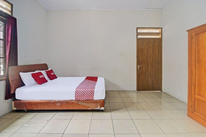Imagen de la habitación del Hotel OYO 92041 Borneo. Foto 13