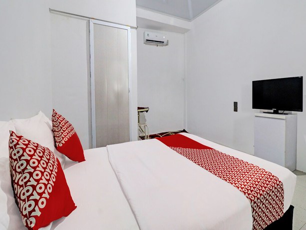 Imagen de la habitación del Hotel OYO 92054 Gala Residence. Foto 7