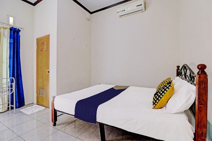 Imagen de la habitación del Hotel OYO 92056 Asri Kost Syariah. Foto 3