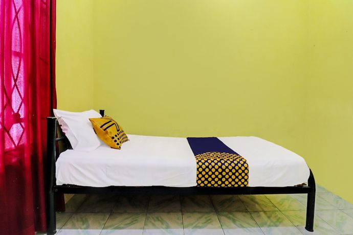 Imagen de la habitación del Hotel OYO 92056 Asri Kost Syariah. Foto 8