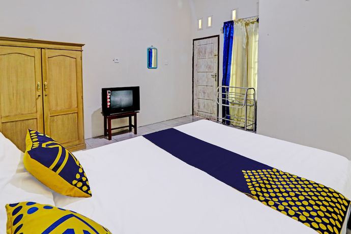 Imagen de la habitación del Hotel OYO 92056 Asri Kost Syariah. Foto 10