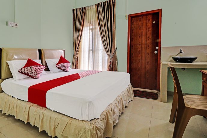 Imagen de la habitación del Hotel OYO 92069 Rafa Kost. Foto 2