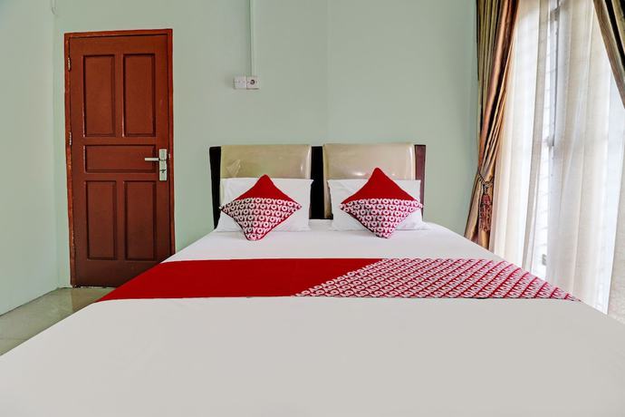 Imagen de la habitación del Hotel OYO 92069 Rafa Kost. Foto 7