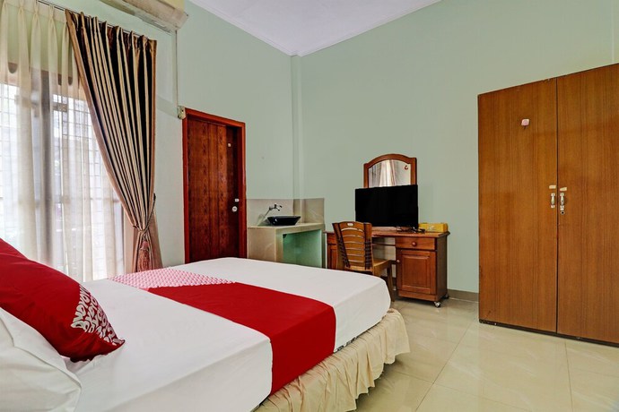 Imagen de la habitación del Hotel OYO 92069 Rafa Kost. Foto 10