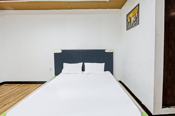 Imagen de la habitación del Hotel OYO 92090 Panorama Rinjani Lodge. Foto 5