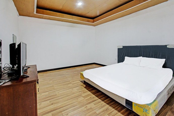 Imagen de la habitación del Hotel OYO 92090 Panorama Rinjani Lodge. Foto 8
