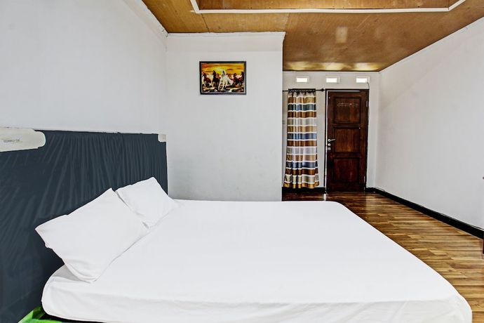 Imagen de la habitación del Hotel OYO 92090 Panorama Rinjani Lodge. Foto 9