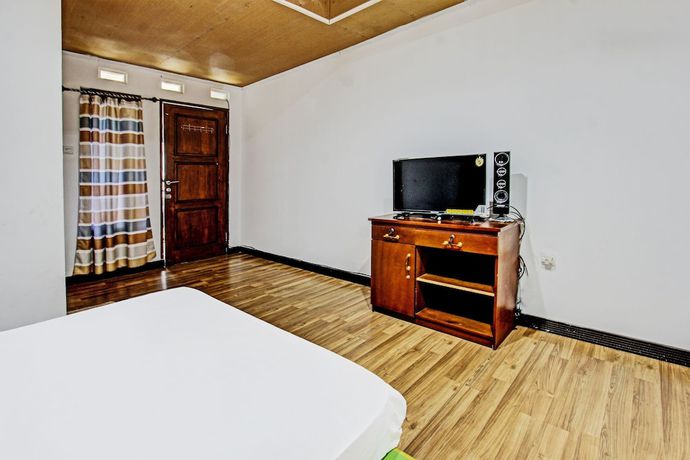 Imagen de la habitación del Hotel OYO 92090 Panorama Rinjani Lodge. Foto 10