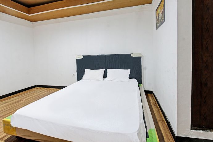 Imagen de la habitación del Hotel OYO 92090 Panorama Rinjani Lodge. Foto 11