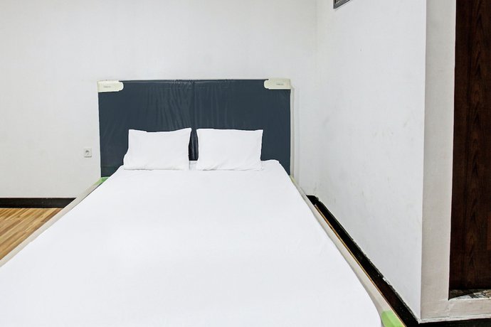 Imagen de la habitación del Hotel OYO 92090 Panorama Rinjani Lodge. Foto 14