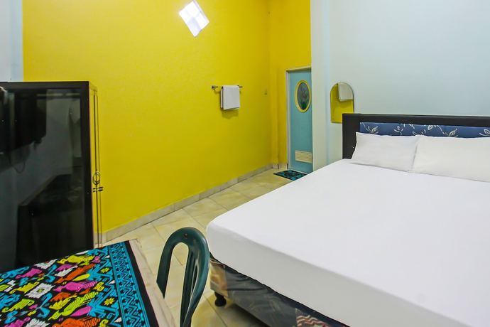 Imagen de la habitación del Hotel OYO 92095 Wisma Dhana Syariah. Foto 2