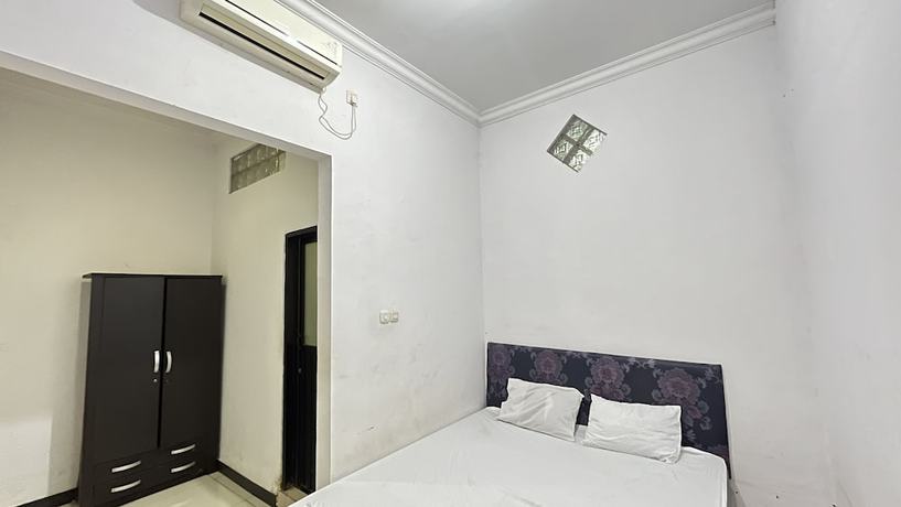 Imagen de la habitación del Hotel OYO 92100 Kost Biru. Foto 5