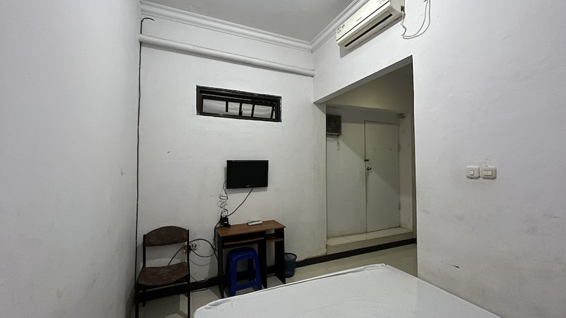 Imagen de la habitación del Hotel OYO 92100 Kost Biru. Foto 12