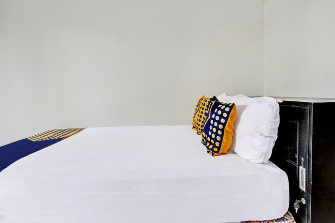 Imagen de la habitación del Hotel OYO 92123 Chikam House Syariah. Foto 5