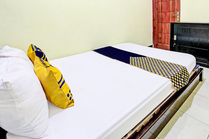 Imagen de la habitación del Hotel OYO 92123 Chikam House Syariah. Foto 6