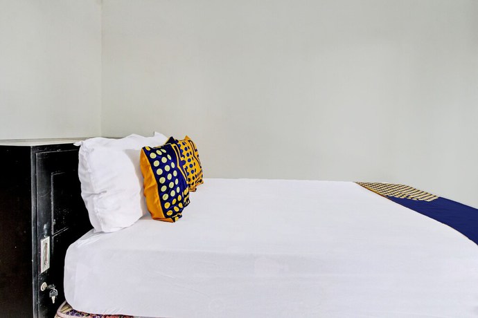 Imagen de la habitación del Hotel OYO 92123 Chikam House Syariah. Foto 10