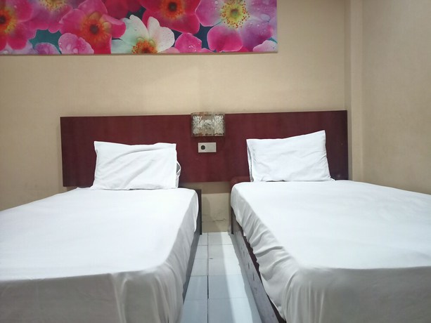 Imagen de la habitación del Hotel OYO 92126 Syariah Sumber Mulya Nunukan. Foto 2
