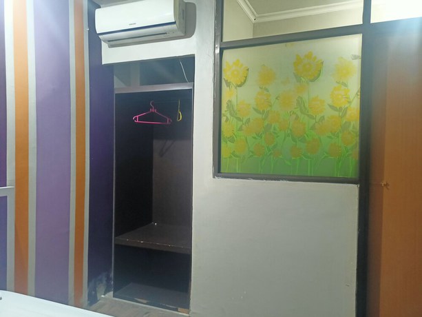 Imagen de la habitación del Hotel OYO 92126 Syariah Sumber Mulya Nunukan. Foto 6