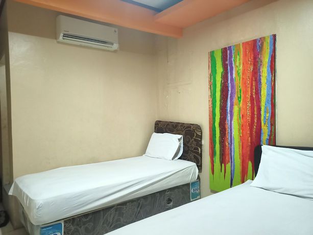 Imagen de la habitación del Hotel OYO 92126 Syariah Sumber Mulya Nunukan. Foto 9