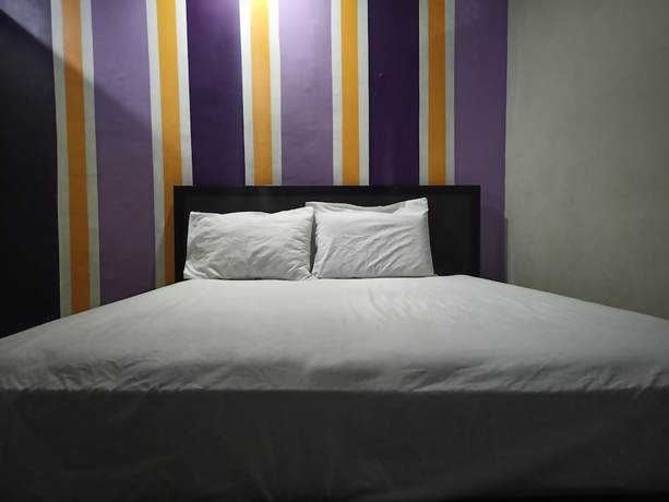 Imagen de la habitación del Hotel OYO 92126 Syariah Sumber Mulya Nunukan. Foto 10