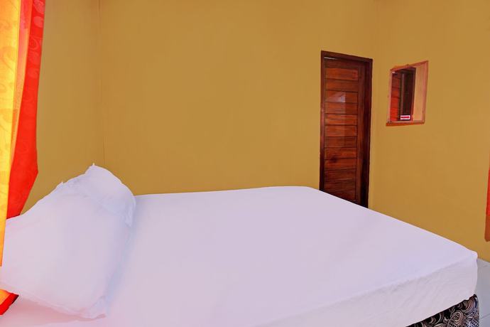 Imagen de la habitación del Hotel OYO 92142 Ujung Samalas Homestay. Foto 4
