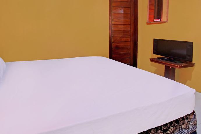 Imagen de la habitación del Hotel OYO 92142 Ujung Samalas Homestay. Foto 10