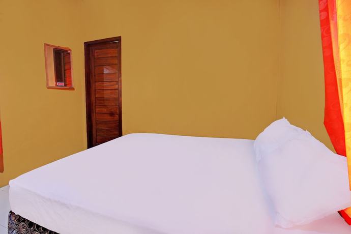 Imagen de la habitación del Hotel OYO 92142 Ujung Samalas Homestay. Foto 14