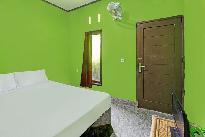 Imagen de la habitación del Hotel OYO 92149 Ashooy Homestay. Foto 20