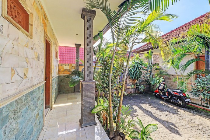 Imagen de los interiores del Hotel OYO 92175 Surya Madu Guest House Near Pantai Kelan. Foto 13