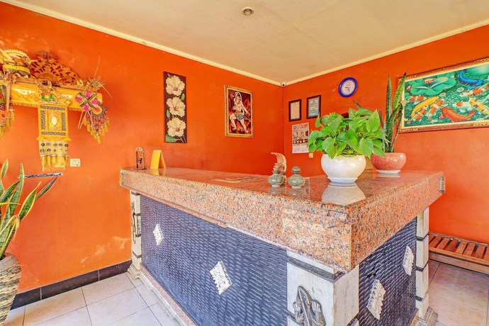 Imagen de los interiores del Hotel OYO 92175 Surya Madu Guest House Near Pantai Kelan. Foto 14