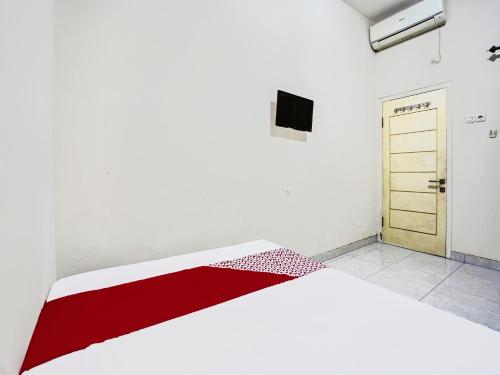 Imagen de la habitación del Hotel OYO 92190 Arya Guest House. Foto 20