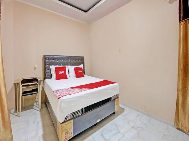 Imagen de la habitación del Hotel OYO 92193 Kos 21. Foto 3