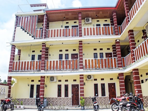 Imagen de los interiores del Hotel OYO 92193 Kos 21. Foto 10