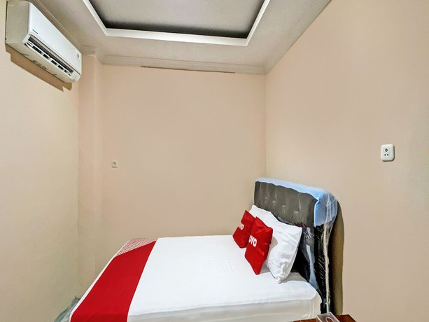 Imagen de la habitación del Hotel OYO 92193 Kos 21. Foto 4