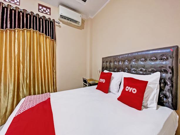 Imagen de la habitación del Hotel OYO 92193 Kos 21. Foto 6