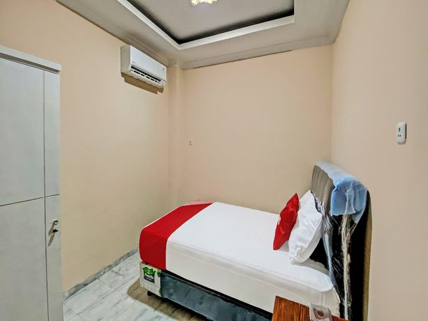 Imagen de la habitación del Hotel OYO 92193 Kos 21. Foto 7