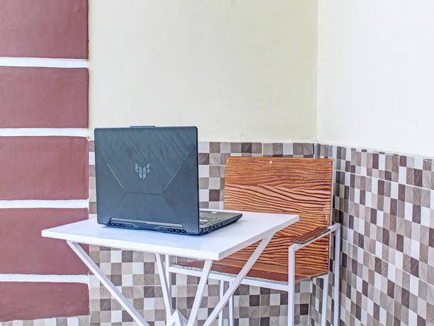 Imagen de los interiores del Hotel OYO 92193 Kos 21. Foto 14