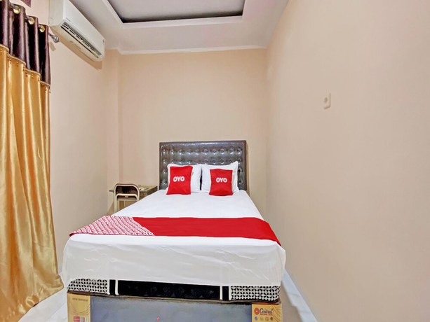 Imagen de la habitación del Hotel OYO 92193 Kos 21. Foto 9