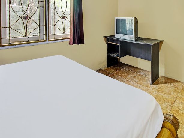 Imagen de la habitación del Hotel OYO 92197 Zahira Homestay. Foto 5