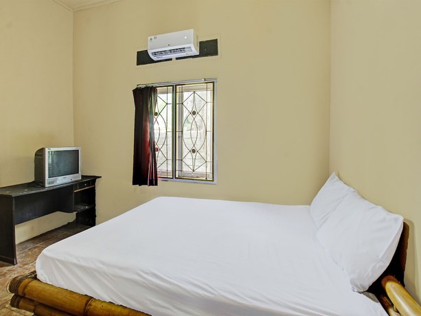 Imagen de la habitación del Hotel OYO 92197 Zahira Homestay. Foto 8