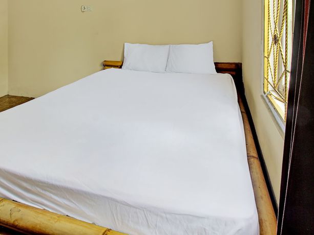 Imagen de la habitación del Hotel OYO 92197 Zahira Homestay. Foto 9