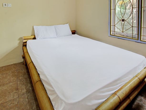 Imagen de la habitación del Hotel OYO 92197 Zahira Homestay. Foto 10