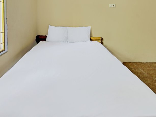 Imagen de la habitación del Hotel OYO 92197 Zahira Homestay. Foto 13