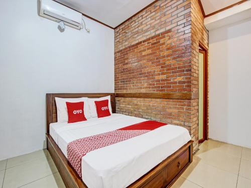 Imagen de la habitación del Hotel OYO 92201 Nayo Homestay Syariah. Foto 3