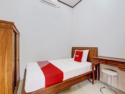 Imagen de la habitación del Hotel OYO 92201 Nayo Homestay Syariah. Foto 5