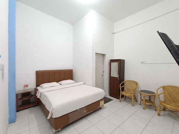 Imagen de la habitación del Hotel OYO 92207 Koperasi. Foto 4