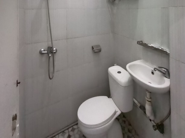 Imagen de la habitación del Hotel OYO 92207 Koperasi. Foto 6